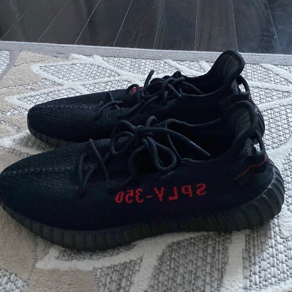 Size 12 Black Yeezy. Worn only once! You can view pictures they are brand new.